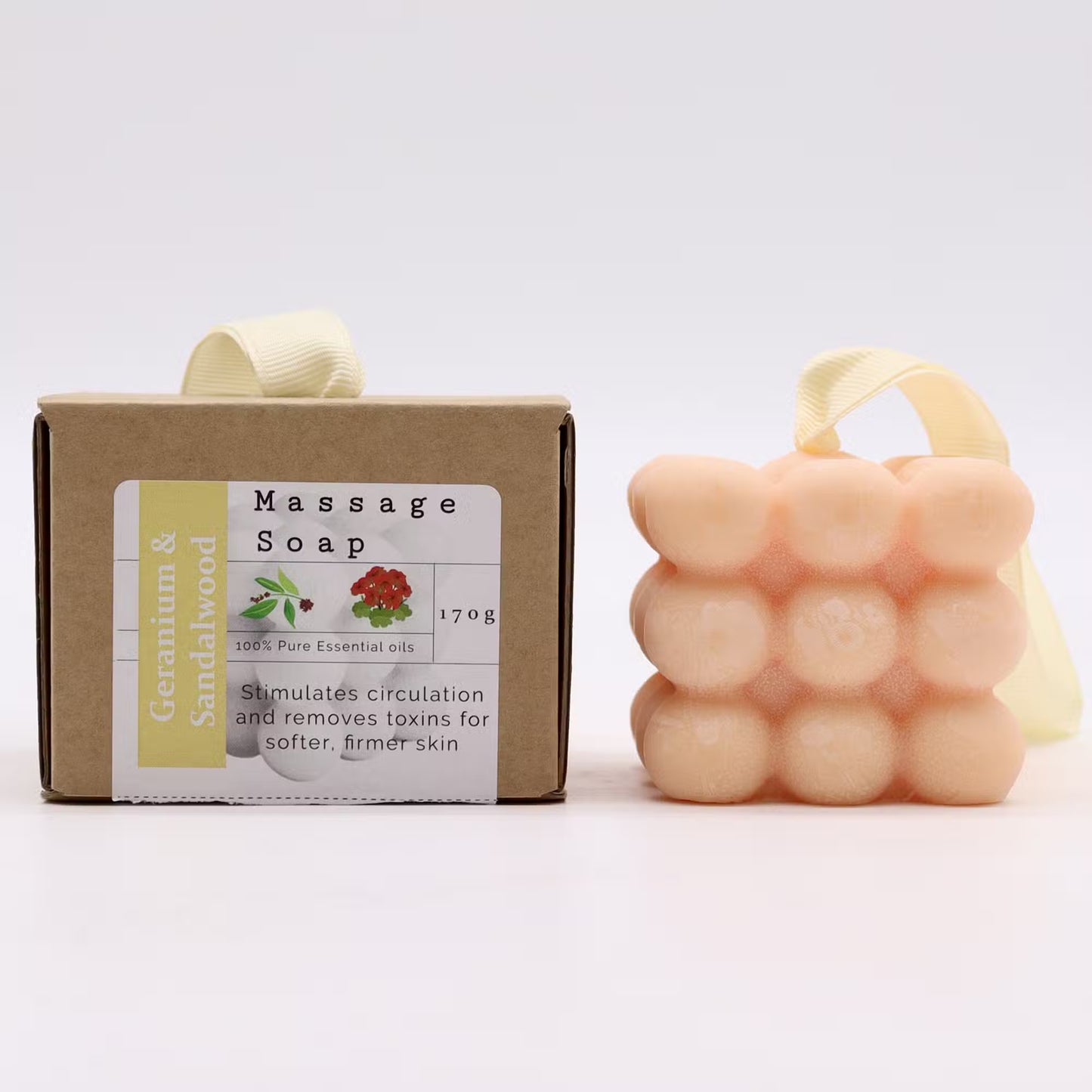 Massage soap with packaging on a white background