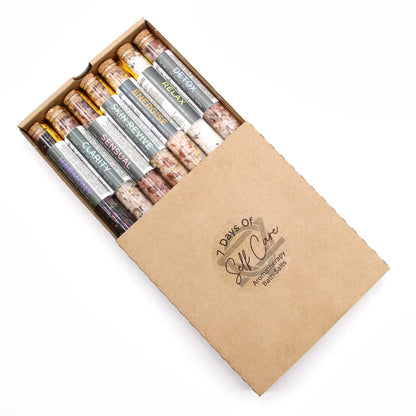 Box of 7 salt sticks with labels in a cardboard box, featuring the brand '7 Days of Self Care'.