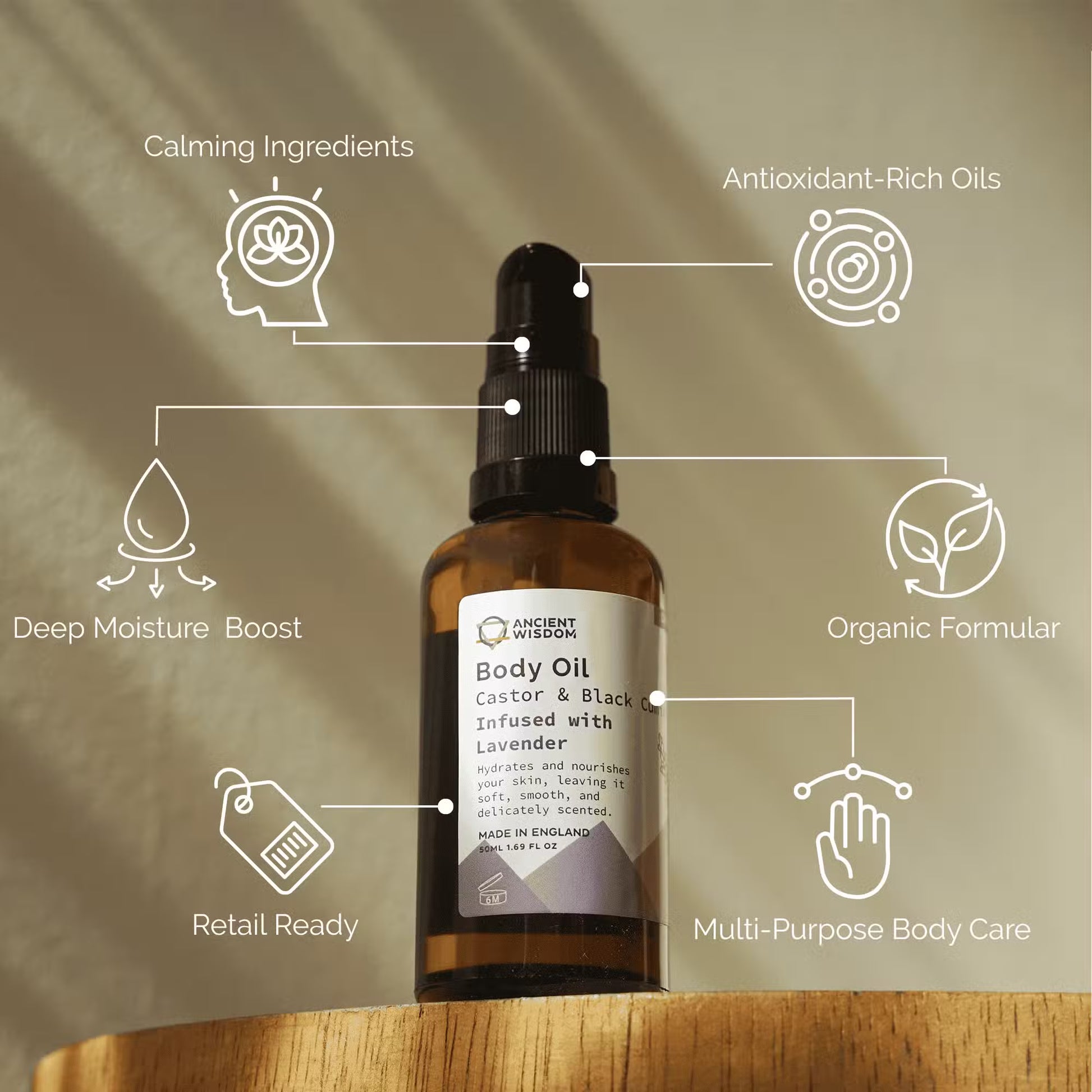 Body oil bottle with label and features on a wooden surface