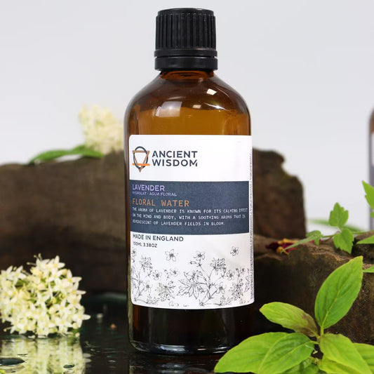 Bottle of Ancient Wisdom lavender floral water with a natural background