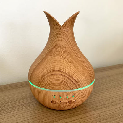 Wooden-textured diffuser on a wooden surface with a plain background