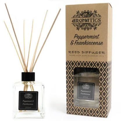 Reed diffuser with packaging labeled 'Aromatics Peppermint & Frankincense' on a white background