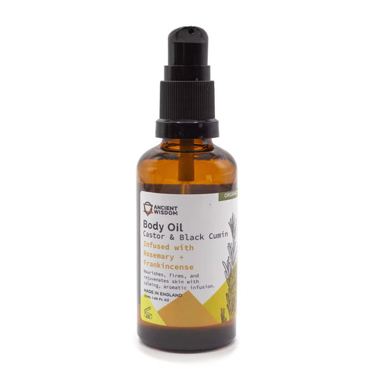 Body oil bottle with label on a white background