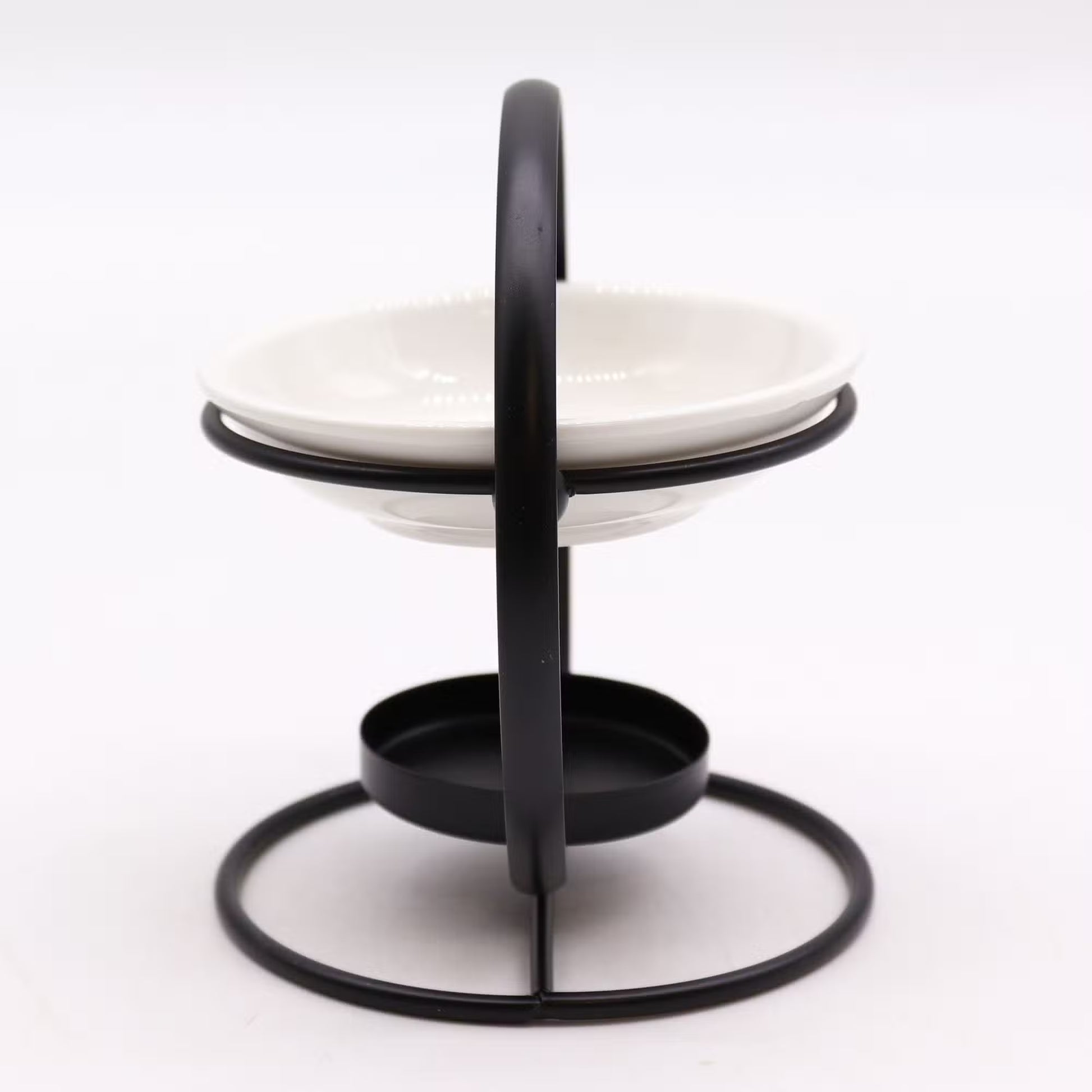 Two-tiered ceramic plate stand with black metal holder on a white background