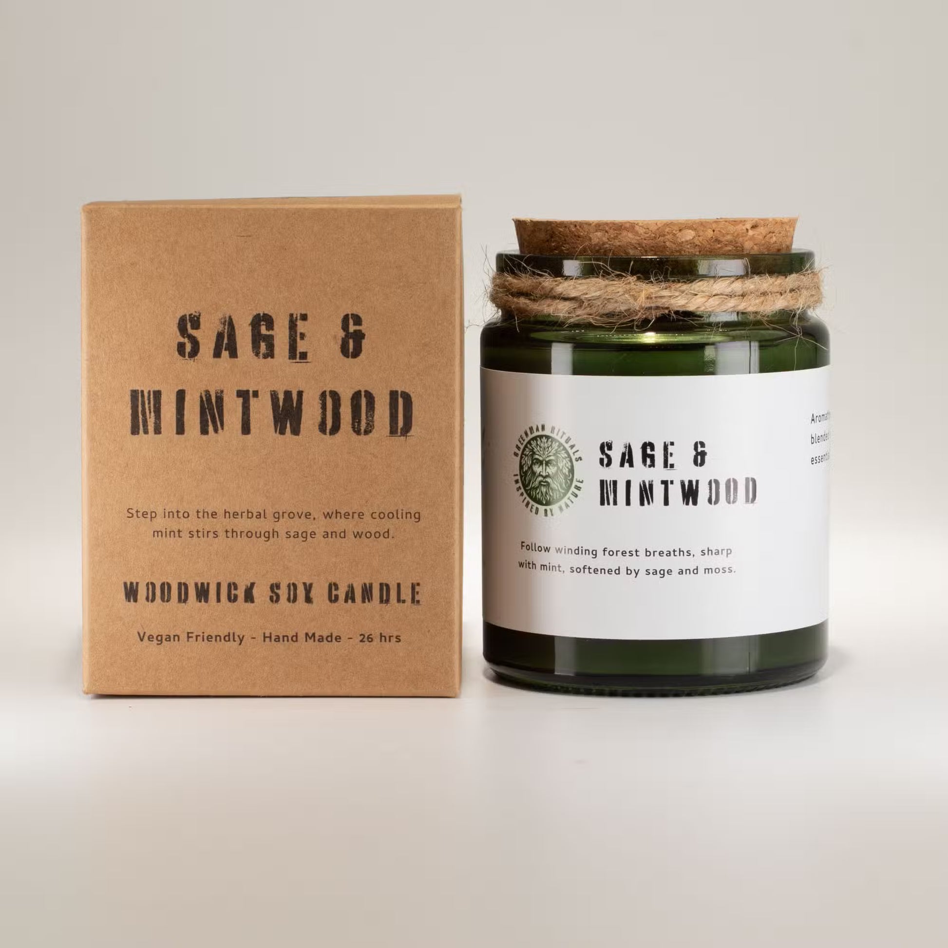 Sage & Mintwood candle with packaging on a light background