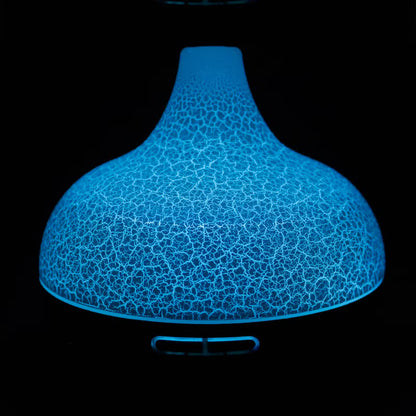 Blue textured lamp on a black background