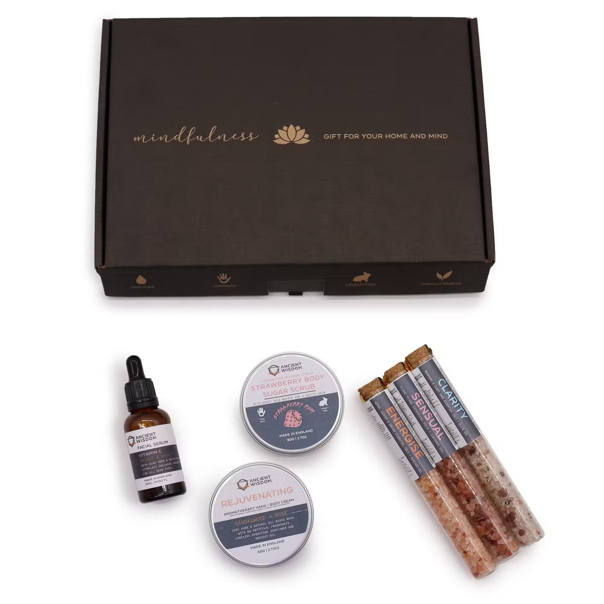 Set of wellness products including a bottle, two containers, and three sticks on a white background with a 'mindfulness' branded box.