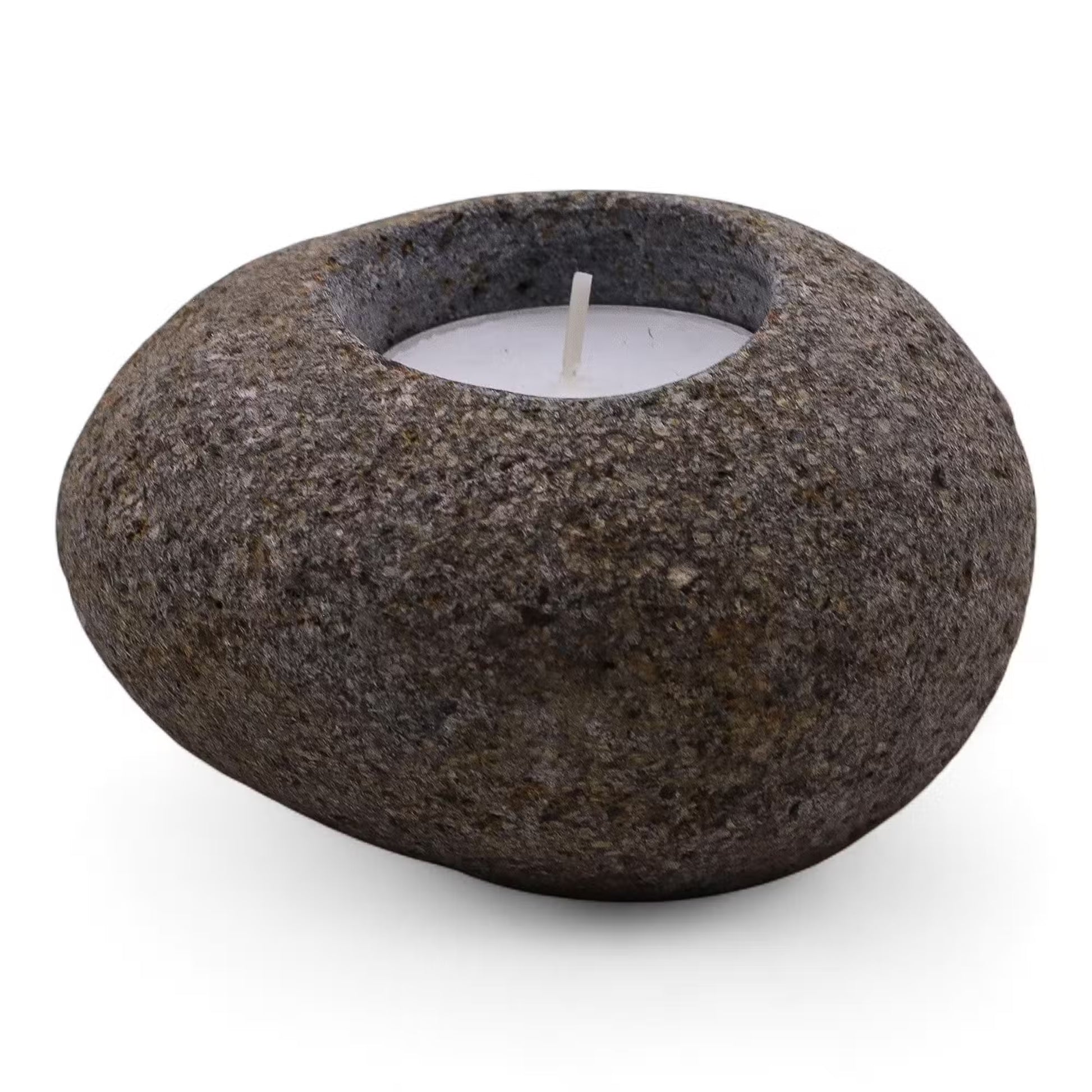 Ceramic candle holder with a candle on a white background