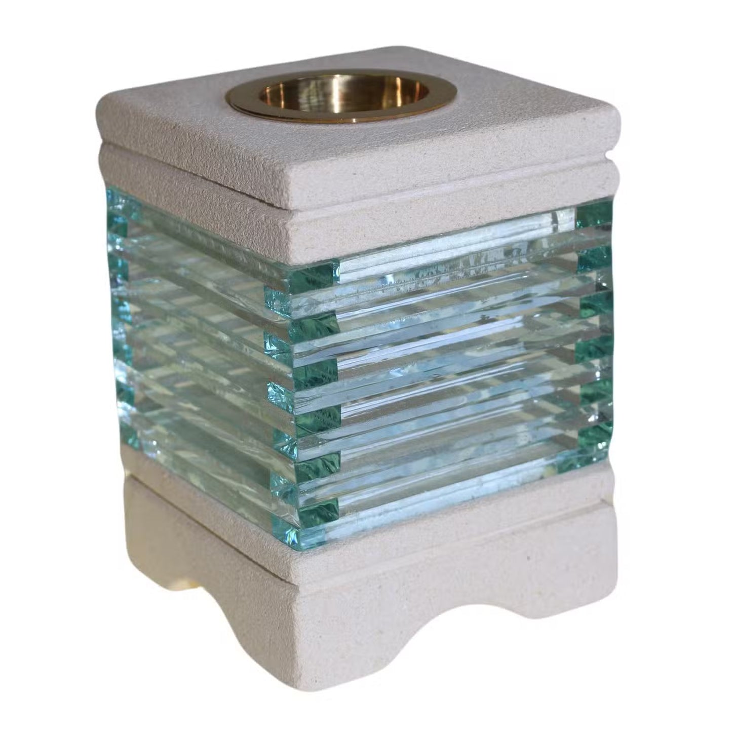A modern square glass candle holder with a textured off-white stone or concrete base and top, featuring a brass-colored metal rim around the top insert and clear ribbed glass panels on the sides.