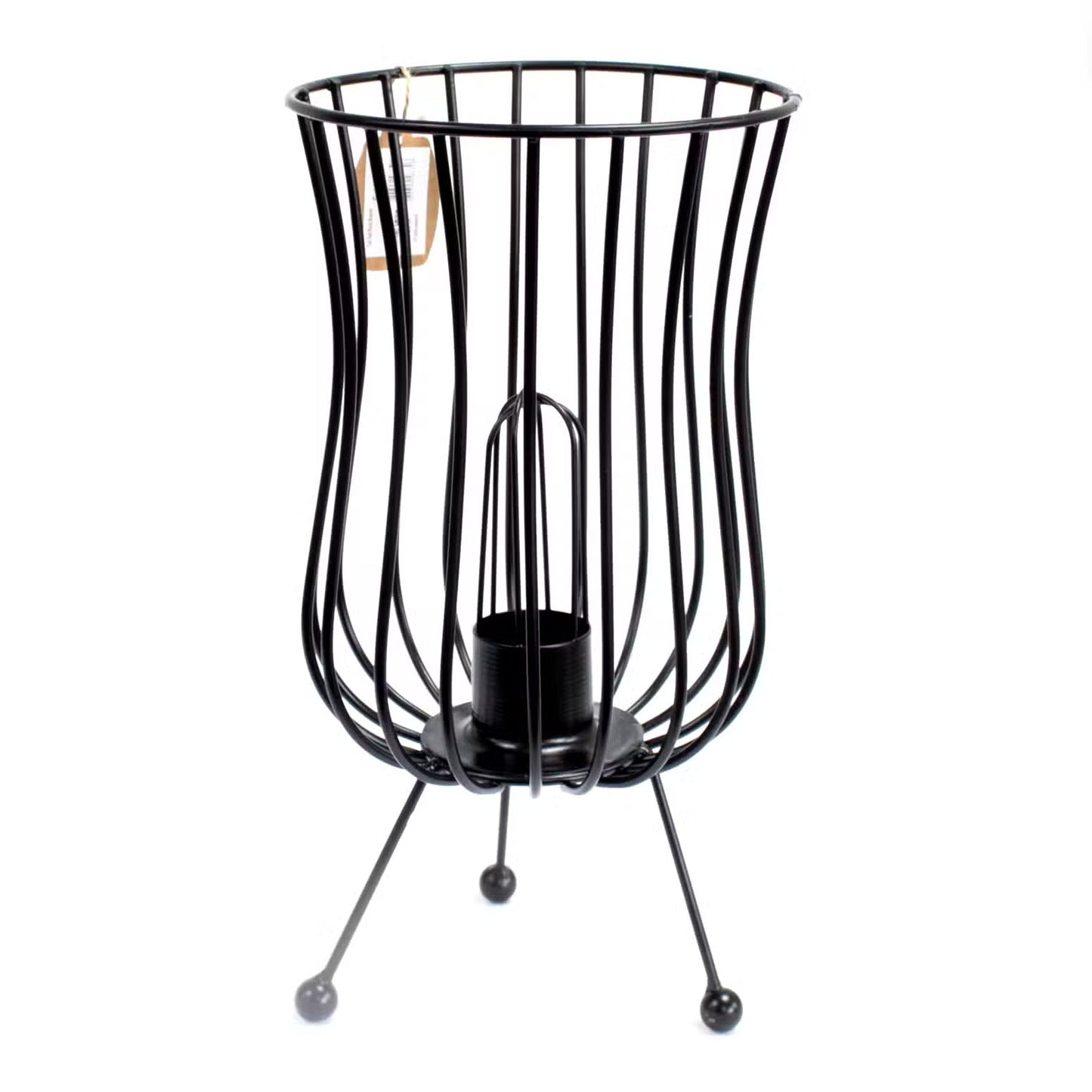 Black wire basket with a candle holder on a white background