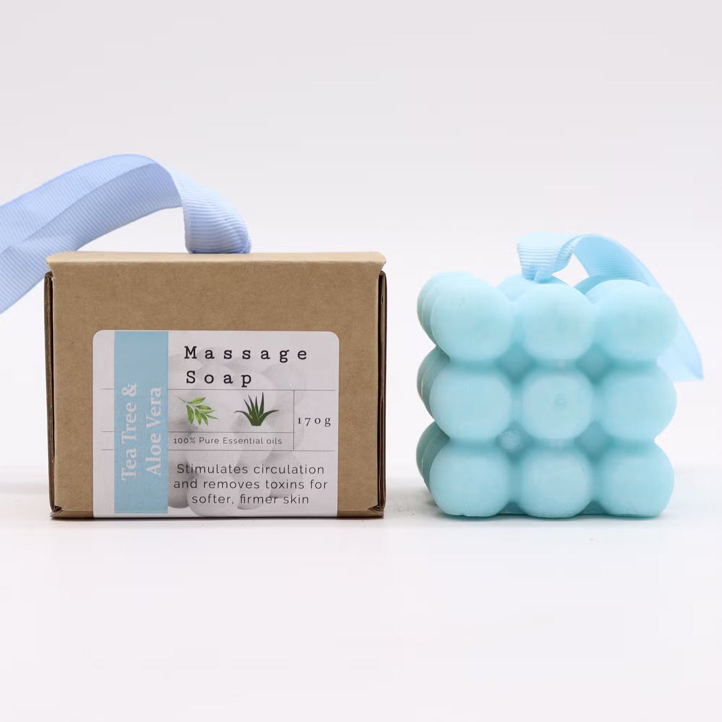 Massage soap with packaging on a white background