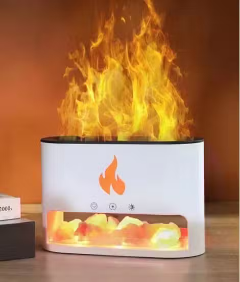 White electronic fireplace with flames on a wooden surface