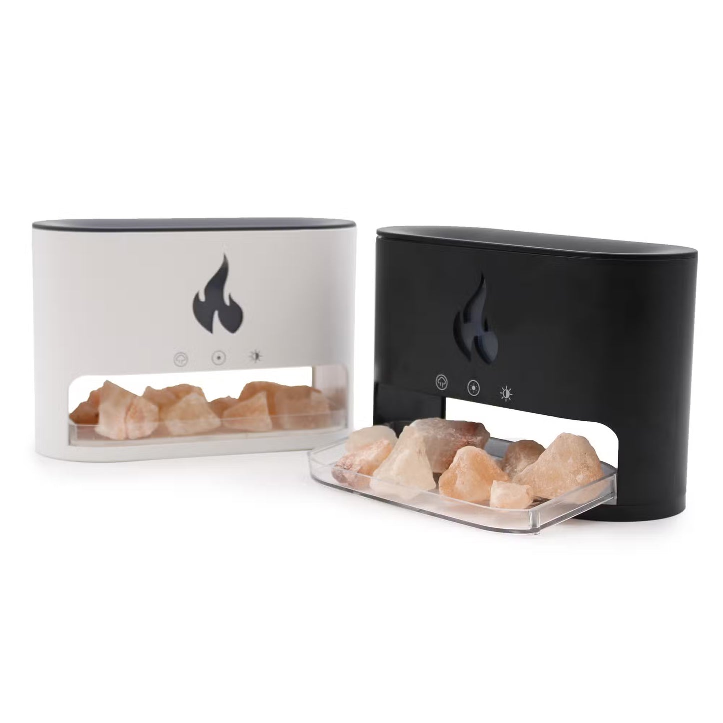 Two Himalayan salt lamps with rock salt on a white background