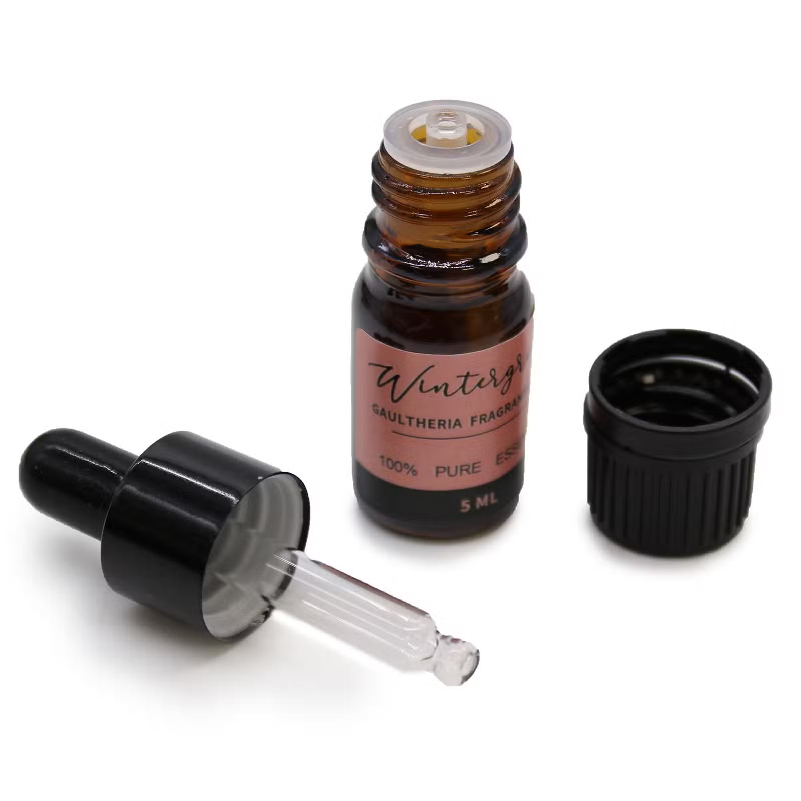 Amber glass essential oil bottle with dropper on a white background