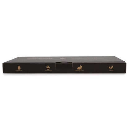 Black product packaging with gold icons and text on a white background