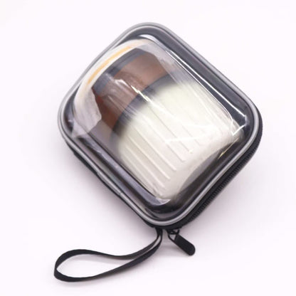 Portable makeup mirror with clear cover on a white background